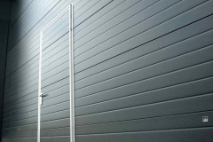 Panel Rib, painted dark grey color, integrated doors