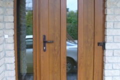 Entrance doors, golden oak color, opening outside